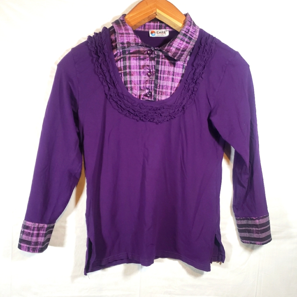 All in one shirt sweater combo. Looks like a flannel in a sweater. Lot of purple